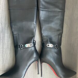 Brand new, never worn, black knee high louboutin boots.